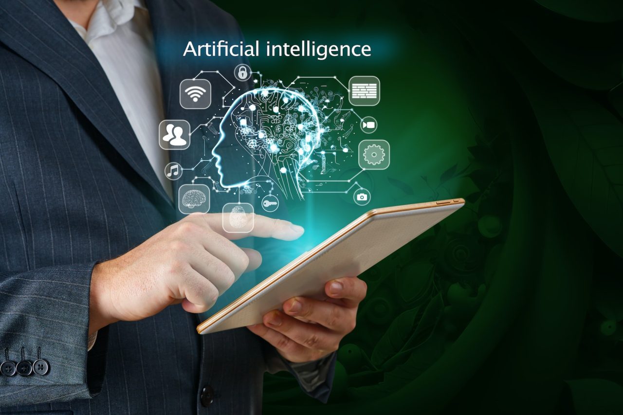businessman-working-on-tablet-using-ai-business-technology-iot-internet-of-things-ai-concept